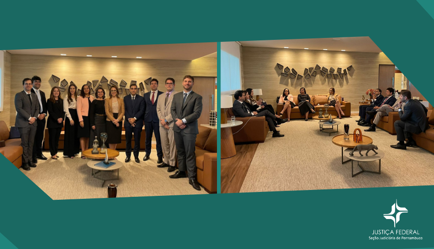 Foto com magistrados e procuradores durante a visita 