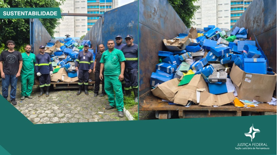 Mostra pessoas em pé, em frente a caminhão com papéis