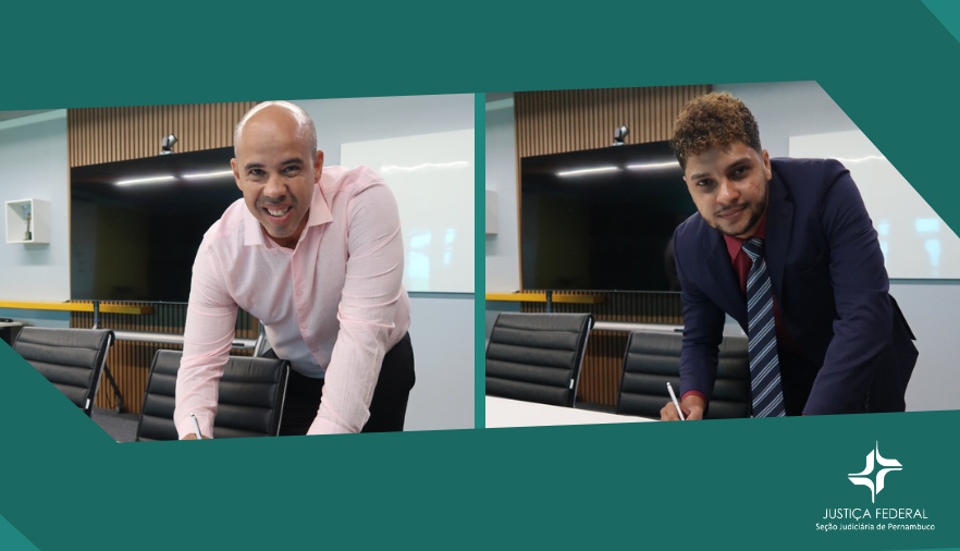 Mostra dois homens assinando um papel